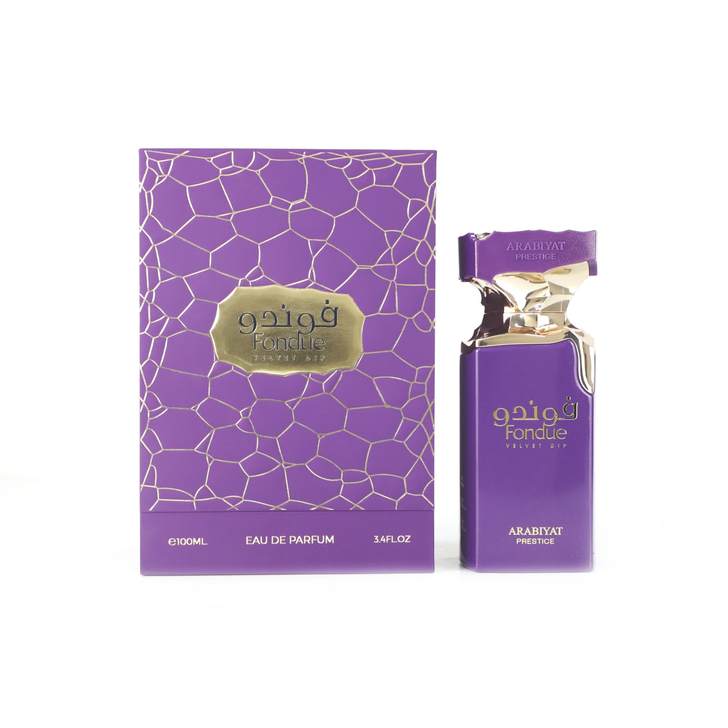 A purple and gold box labeled ARABIYAT PRESTIGE - FONDUE VELVET DRIP 3.4FL.OZ EDP stands beside a matching bottle with gold cap; both feature geometric patterns and Arabic script, evoking its signature woody gourmand scent for women and men.