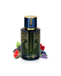 A dark green and gold ARABIYAT PRESTIGE - BLUEBERRY MUSK 3.4FL.OZ EDP bottle with intricate designs stands amid raspberries, blackberries, blueberries, a red rose, and purple lavender on a white background, evoking its unique fragrance.