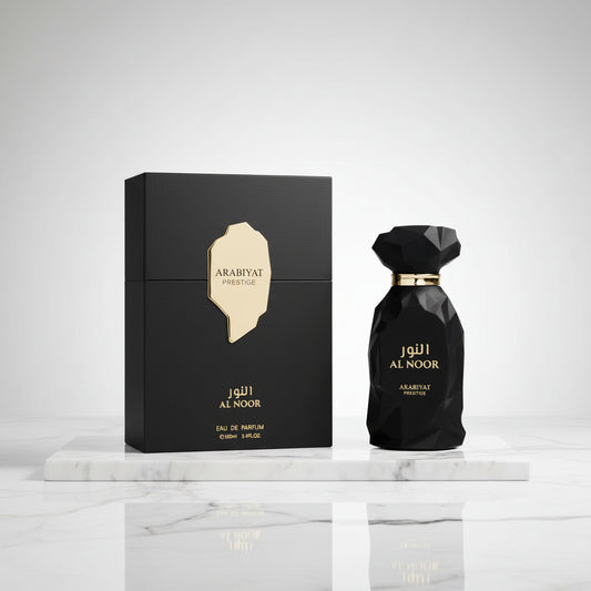 Arabiyat Al Noor perfume bottle and packaging on a white background